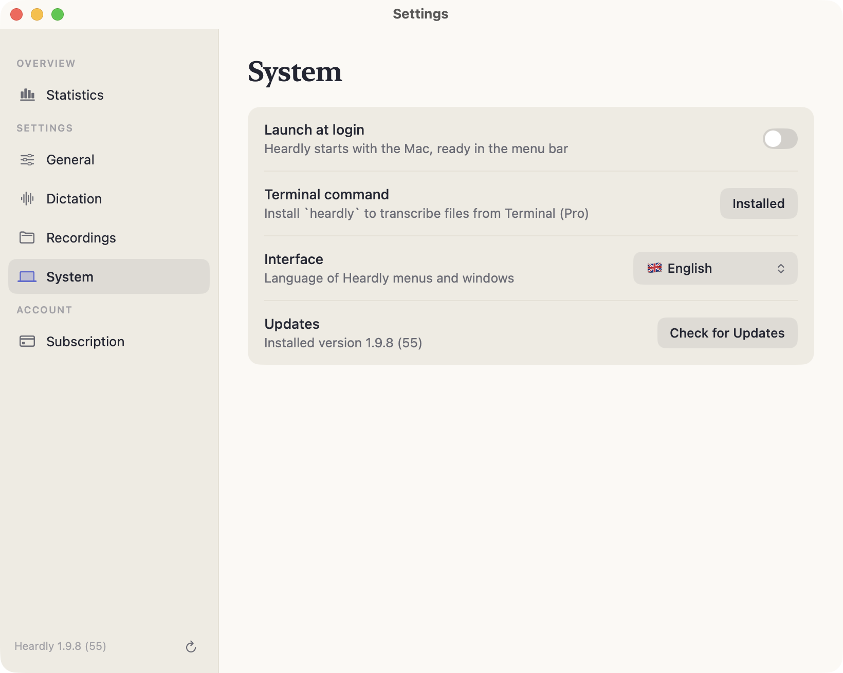 The System section: launch at login, terminal command, interface language and updates with the version number